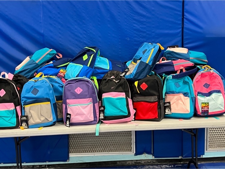 backpacks on a table 